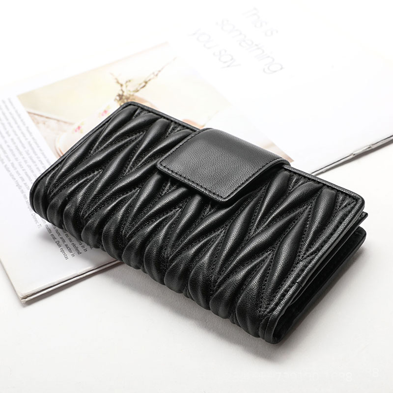 Faltiges 100 % Schaffell-Geldb – Luxury Quilted Bags Bewertung und Preis