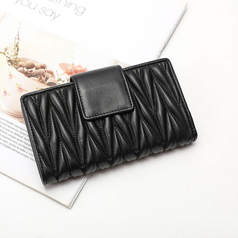 Faltiges 100 % Schaffell-Geldb – Luxury Quilted Bags Bewertung und Preis